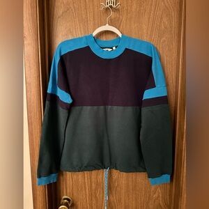 Cotopaxi drawstring bottom sweatshirt